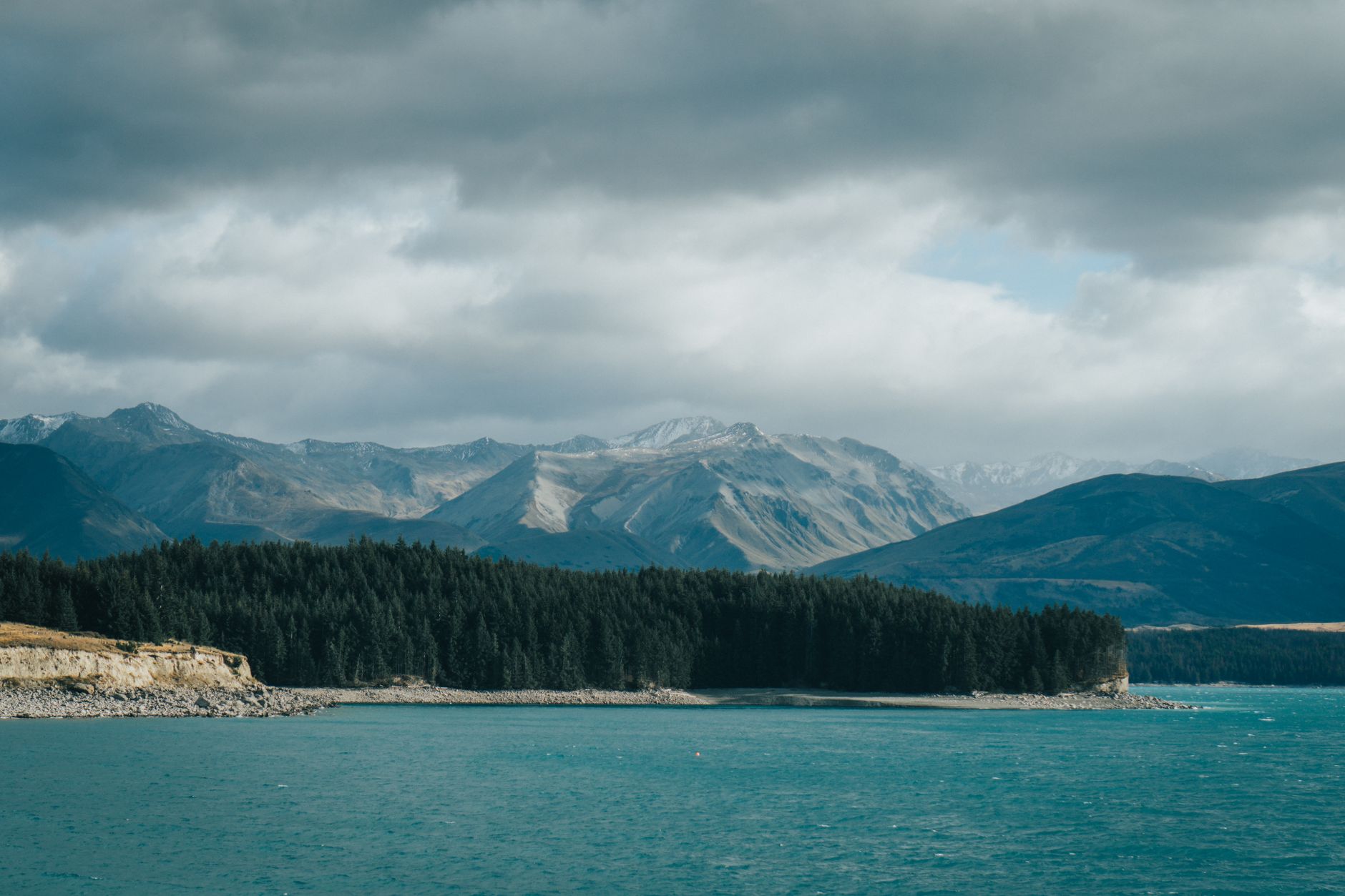 Dramatic view of New Zealand southern alps and mountain lake